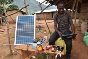 African man working on renewable energy